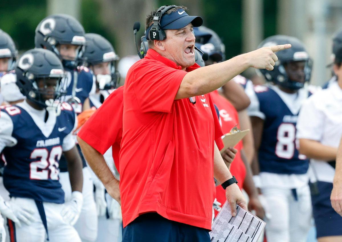 Columbus High School head coach Dave Dunn works from the sidelines during the game against Palmetto High School at Tropical Park Stadium in Miami, Florida on Saturday, September 16, 2023.