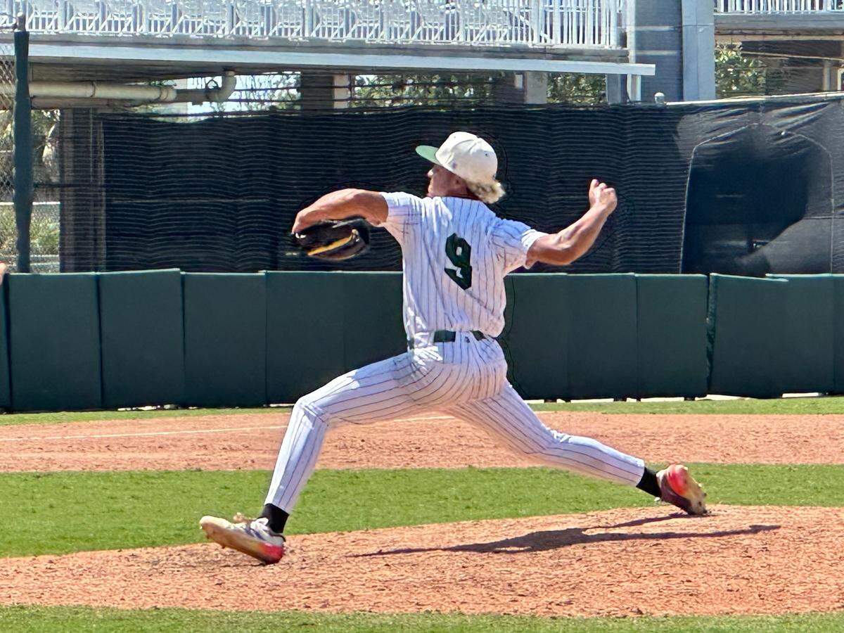 Mater Academy pitcher Alfrin Rosario fires the ball to the plate during the seventh inning of Thursday’s Class 5A state baseball semifinal against Fort Myers at Hammond Stadium in Fort Myers, Fla.