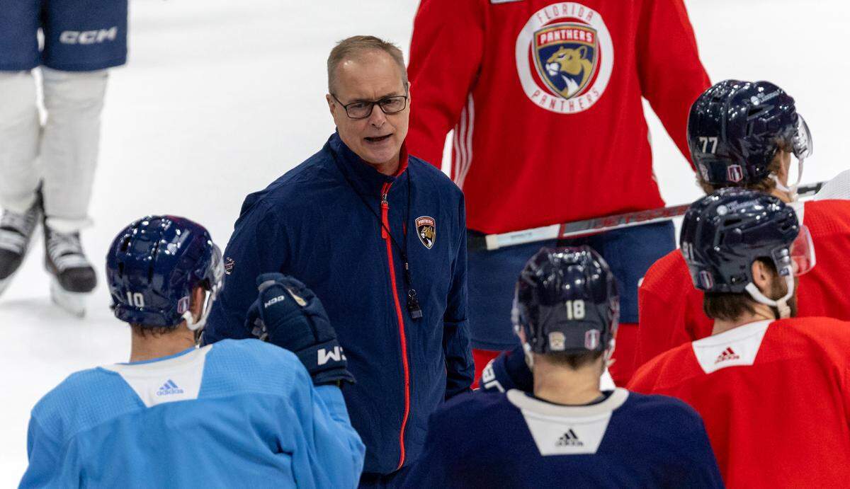 Florida Panthers head coach Paul Maurice talk with his players during practice in preparation for Game 1 of the Stanley Cup Finals against the Edmonton Oilers at the Amerant Bank Arena on Friday, June 7, 2024, in Sunrise, Fla.