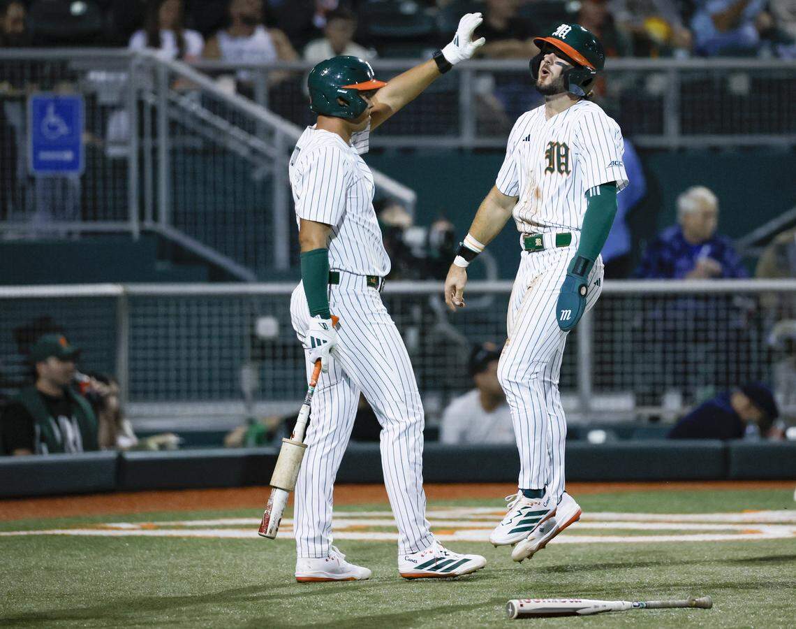 Miami Hurricanes outfielder Michael Torres (34) scores in the third inning during the Hurricanes season opener against the Lehigh Mountain Hawks at Mark Light Field in Coral Gables, Florida, Florida on Friday, February 13, 2026