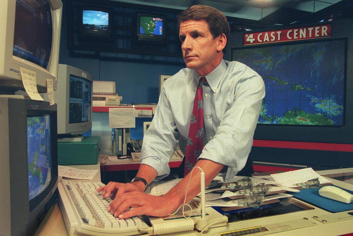 Bryan Norcross, Channel 4 weather expert, gets ready for his report, in 1997