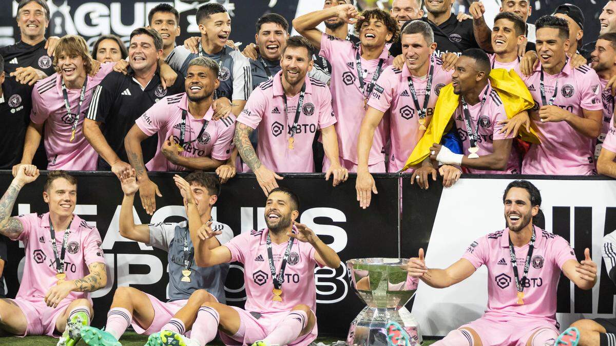 Inter Miami players celebrate with the Leagues Cup after defeating Nashville SC in the final match of the tournament at GEODIS Park on Saturday, Aug. 19, 2023, in Nashville, Tenn. Lionel Messi will miss Inter Miami’s 2024 Leagues Cup opener with an ankle injury.