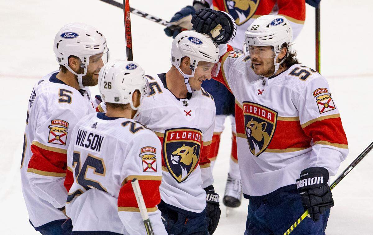Florida Panthers center Noel Acciari (55) is congratulated by teammates after scoring during the second period of the first training camp scrimmage in preparation for the 2021 NHL season at the BB&T Center on Thursday, January 7, 2021 in Sunrise.