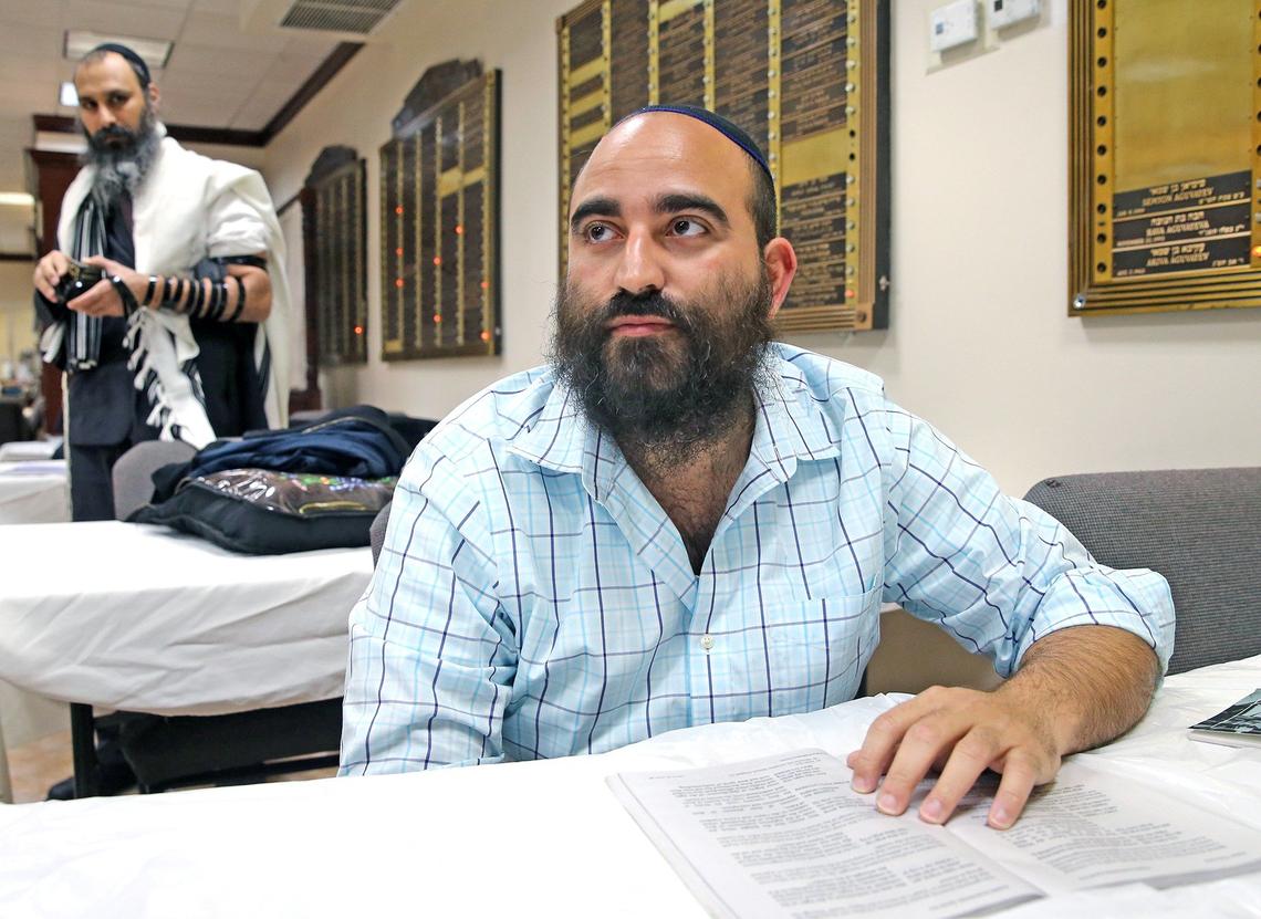 Hallandale Beach resident Levi Tennenhaus at prayer services at Chabad South Broward. Tennenhaus says he’s grown tired of waiting for the City Commission to approve the eruv. “It’s mind-boggling they’re making it an issue,” he says.