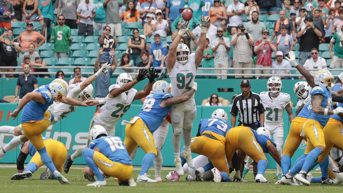 Los Angeles Chargers kicker Cameron Dicker (11) kicks a field goal to win the game against the Miami Dolphins during the second half of their NFL football game at Hard Rock Stadium in Miami Gardens, FL, on Sunday, October 12, 2025. 