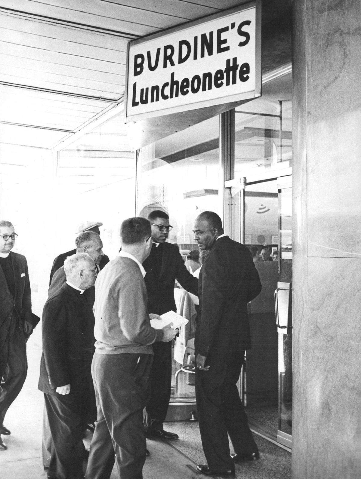 Customers entering Burdines in Miami.