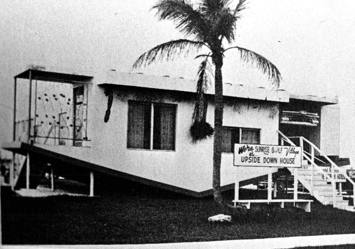 The upside down house that promoted the city of Sunrise Golf Village.