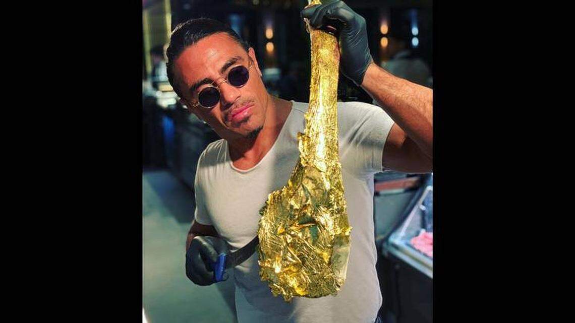 Nusret Gökçe with one of his gold-wrapped steaks.