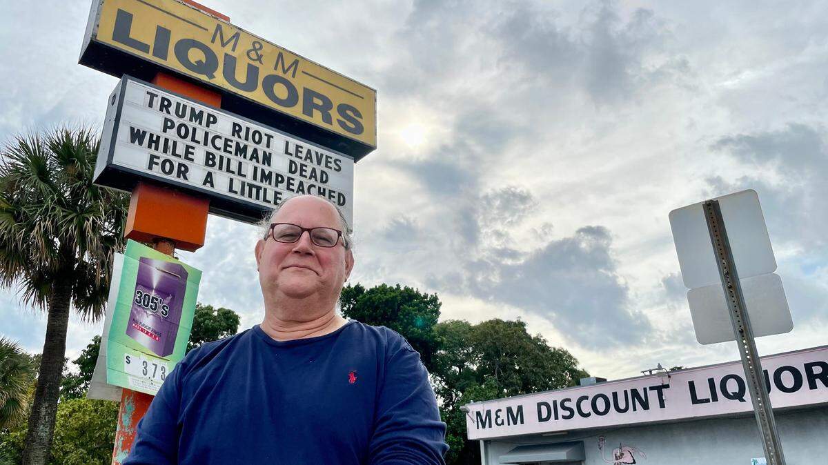 Robert Gewanter posts provocative prose at his M&M Liquors store in Hialeah.