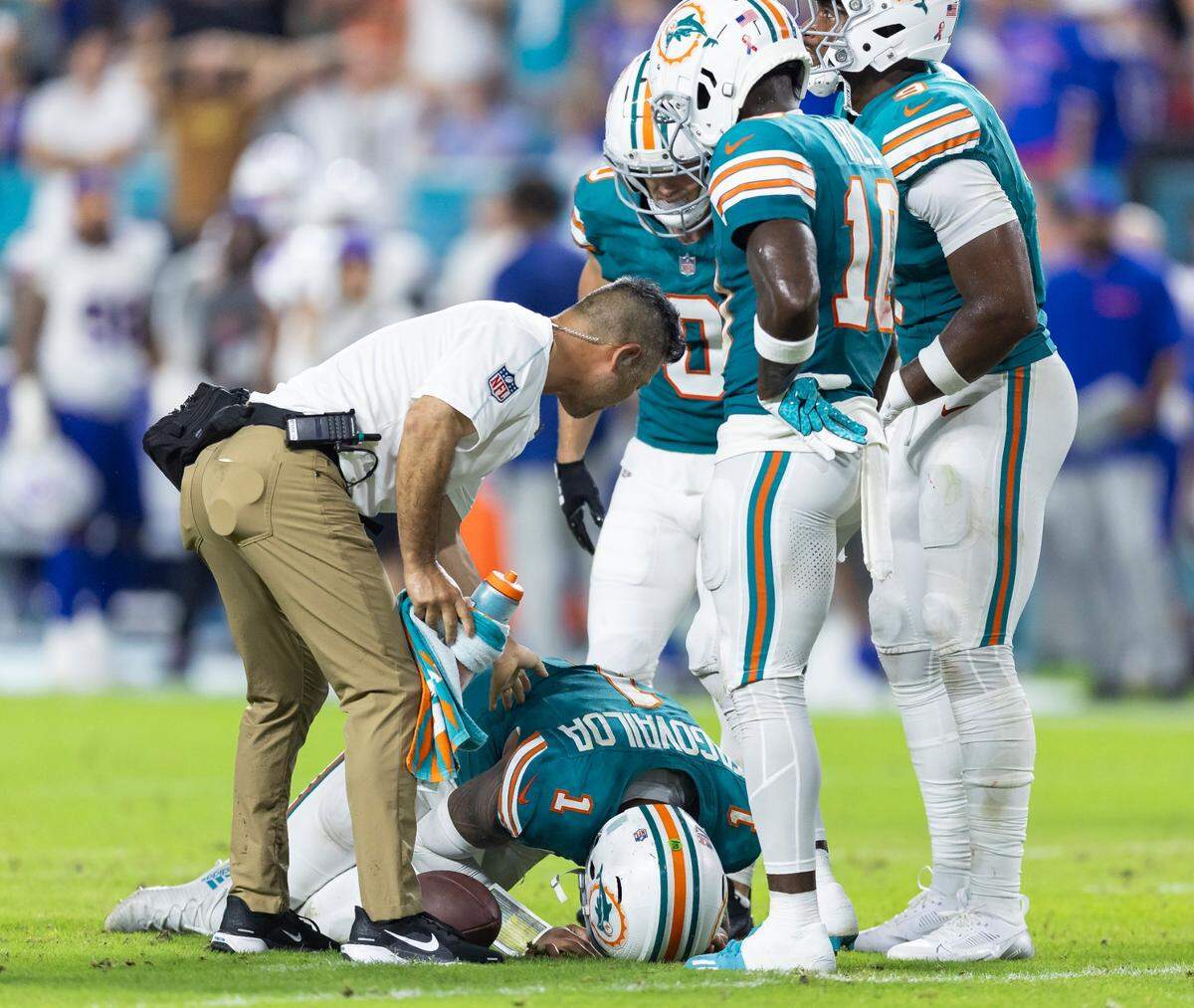 Miami Dolphins quarterback Tua Tagovailoa (1) suffers a concussion after a play against the Buffalo Bills in the second half of their NFL game at Hard Rock Stadium on Thursday, Sept. 12, 2024, in Miami Gardens, Fla.