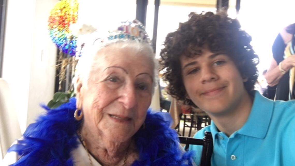 Claire Howard celebrated her 100th birthday with friends and family including great-grandson Jonny Tandy. She is still working as a bookkeeper five days a week.