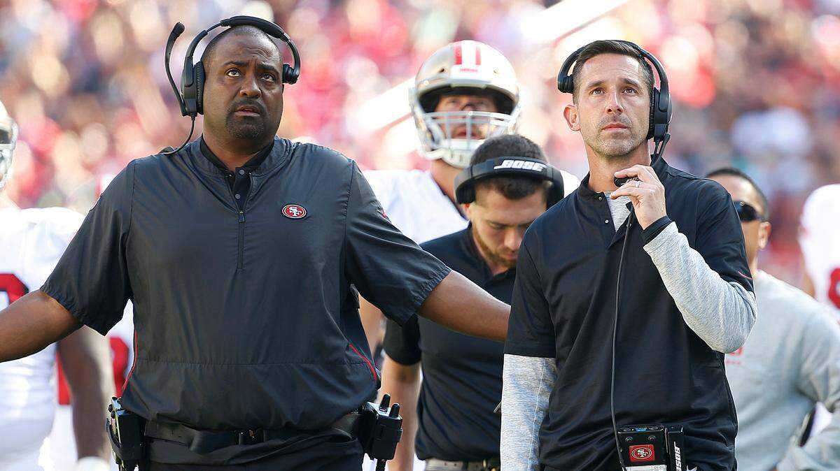 San Francisco 49ers head coach Kyle Shanahan, right, watches from the sideline with assistant coach Jon Embree during the first half of an NFL football game against the Los Angeles Rams in Santa Clara, Calif., Sunday, Oct. 21, 2018. (AP Photo/Josie Lepe)