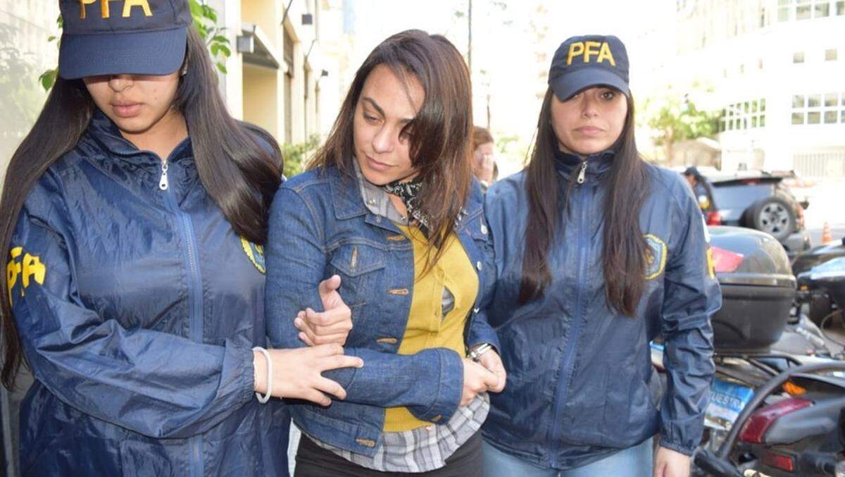 Carolina Pochetti, the widow of Héctor Daniel Muñoz, a former top aide of deceased Argentine President Néstor Kirchner, is arrested by federal police.