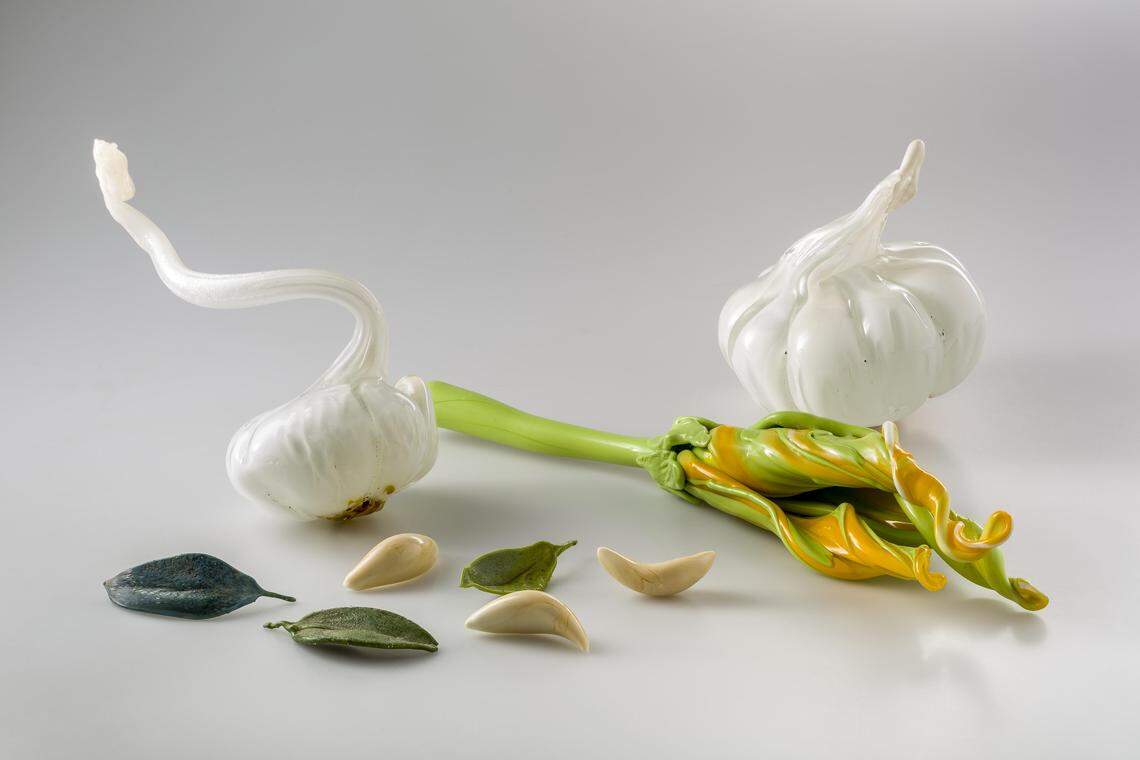 Judi Harvest’s “Garlic, Zucchini Blossom and Herbs,” 2017. Murano glass in assorted techniques. From the show “Cross-Pollination: Honeybees and Murano Glass,” at the Coral Gables Museum through May 20, 2018.