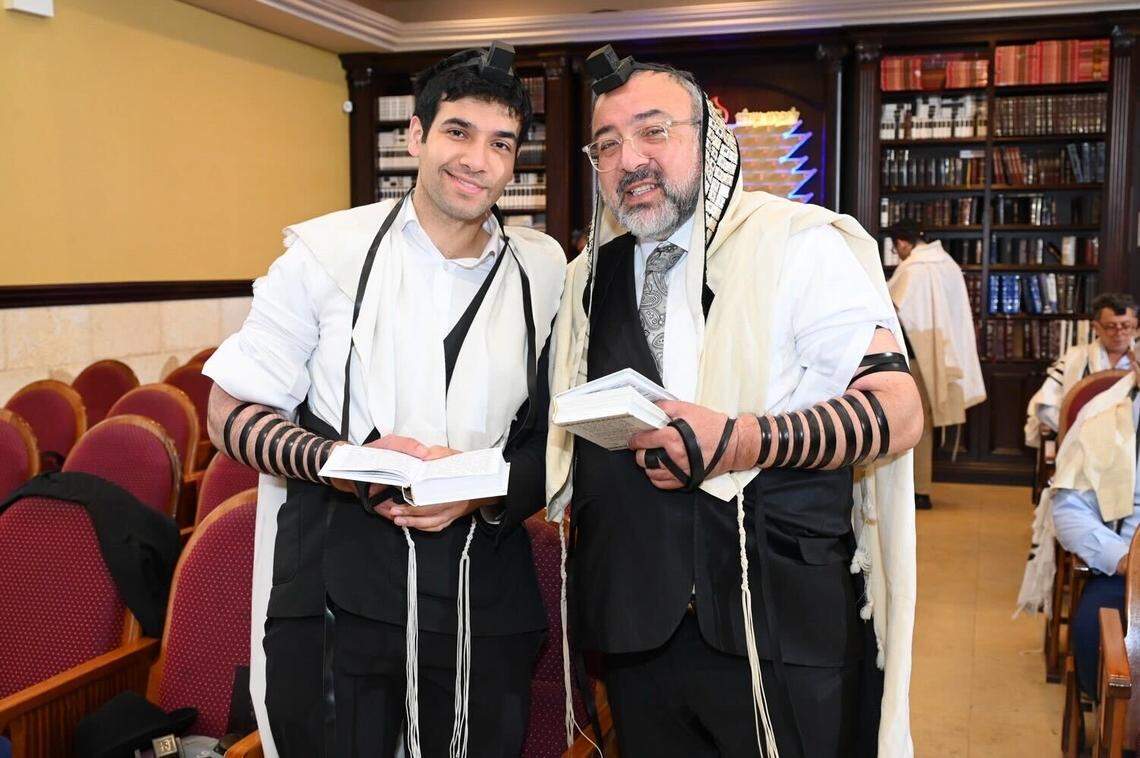 Rabbi Sholom Nisanov, right, and his son Yonah Nisanov, left.