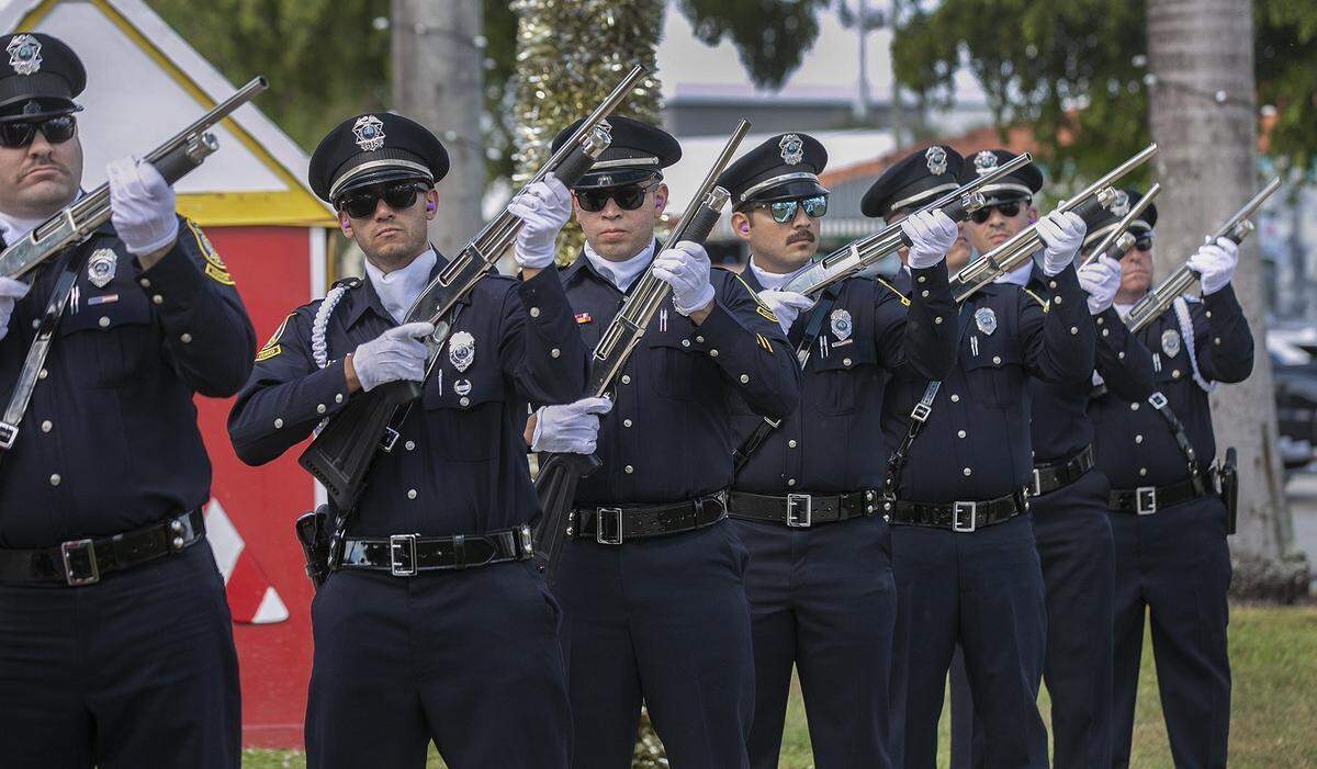 City of Hialeah Police Honor Guard participate in the 21-gun salute for Veterans Day on Sunday, November 11, 2018.