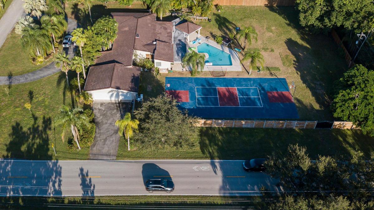 An aerial view of the home in the 7100 block of Southwest 62nd Street on Monday, Oct. 10, 2022, in Miami, Fla. The home is where the UM chapter of Sigma Phi Epsilon hosted a pool party on Oct. 1 after which a video surfaced showing frat brothers chanting about having sex with a dead woman. The national fraternity board shuttered the UM chapter on Oct. 7.