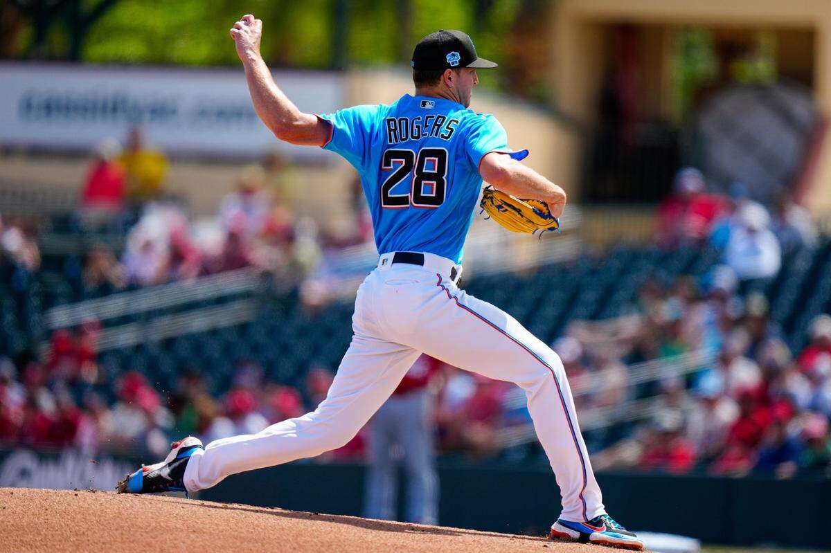 Mar 22, 2023; Jupiter, Florida, USA; Miami Marlins starting pitcher Trevor Rogers (28) throws a pitch against the St. Louis Cardinals during the first inning at Roger Dean Stadium. Mandatory Credit: Rich Storry-USA TODAY Sports