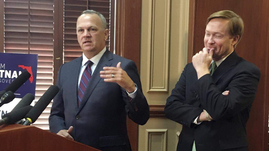 Florida House Speaker Richard Corcoran, left, announces he won't run for governor and will instead back Agriculture Commissioner Adam Putnam, right, on Wednesday, May 9, 2018, in Tallahassee.