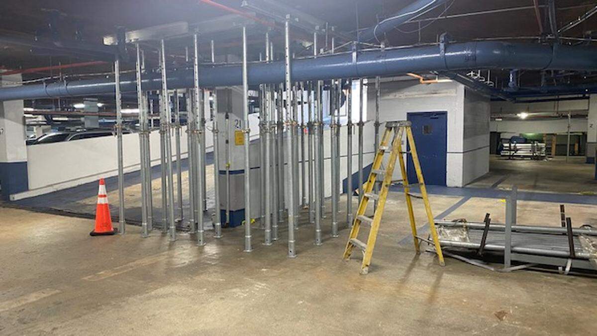 Shoring is visible around a column at Champlain Towers North, sister building to the Champlain Towers South condo that collapsed in June 2021.
