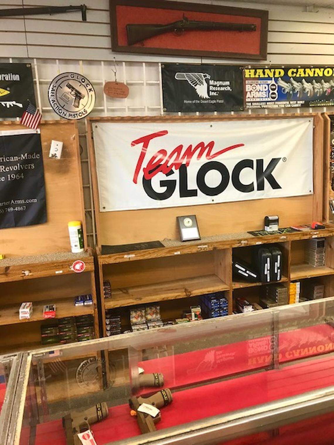 Only three handguns are left at Charlie’s Armory in Miami. Gun and ammunition sales have been soaring across the country as buyers seek protection during the coronavirus pandemic.