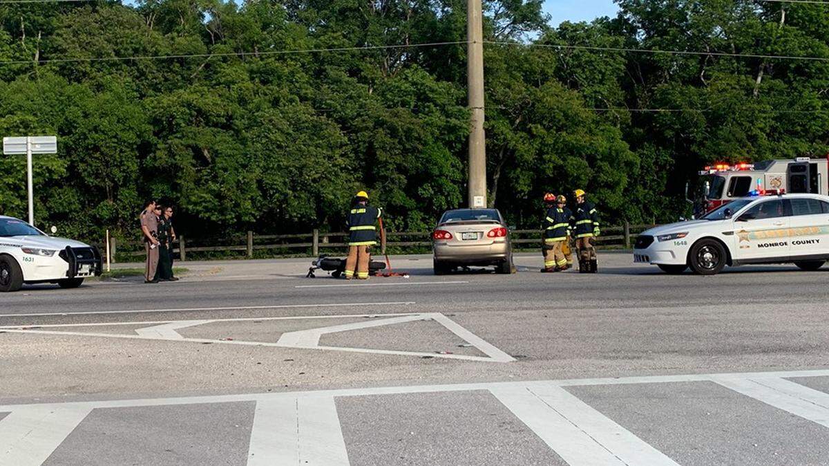 Police investigate the crash between a motorcycle and a car on Wednesday, June 26, 2019.