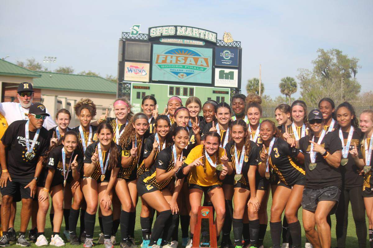American Heritage’s girls’ soccer team celebrates its first state championship since 2019 and the 12th all-time for its program after beating Cape Coral Mariner in penalty kicks on Friday afternoon at Spec Martin Stadium in DeLand.