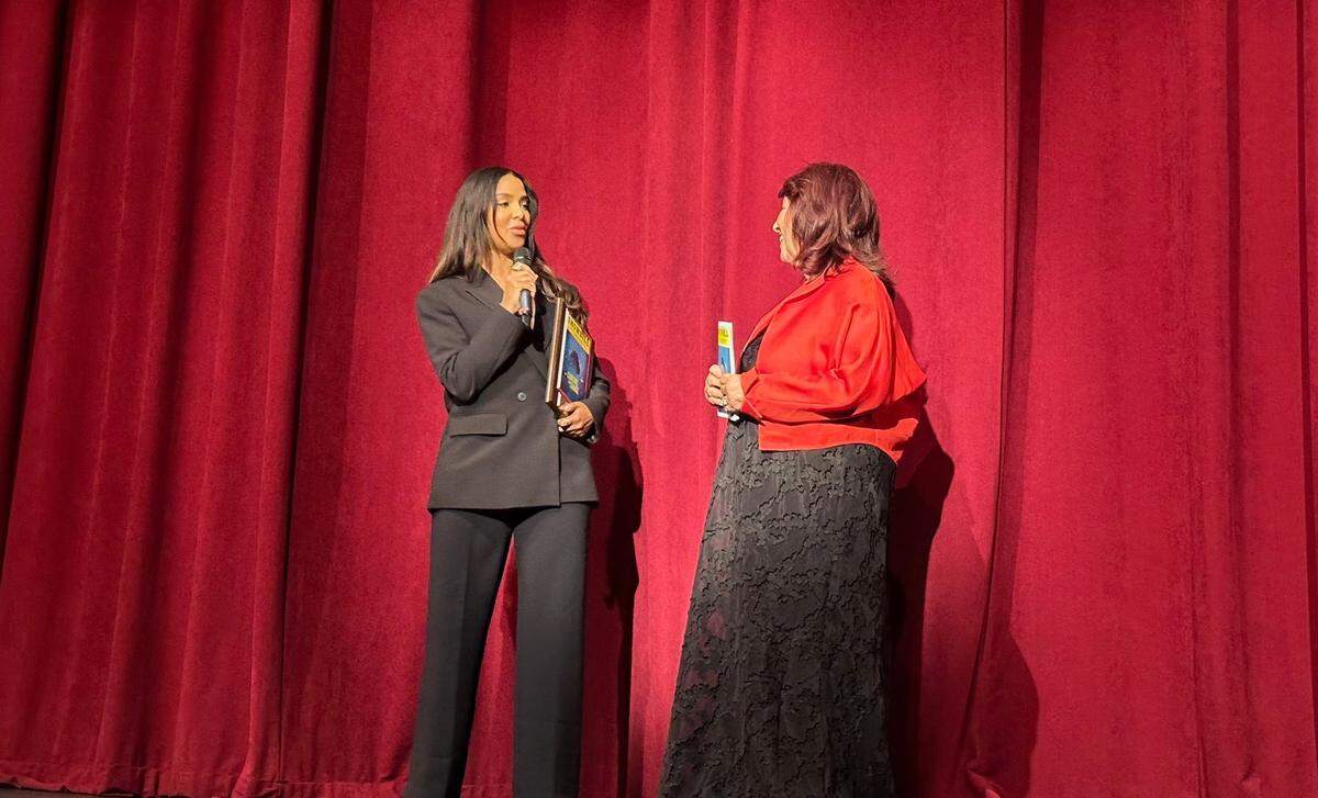 NBC 6 meteorologist Llarisa Abreu accepts a sponsor plaque on behalf of her station from Actors’ Playhouse at the Miracle Theatre’s founding executive producing director Barbara Stein during opening night for “Caroline, or Change” in Coral Gables on March 29, 2024. During her acceptance, Abreu jokingly told the audience she brought the good weather with her for the Easter holiday weekend.