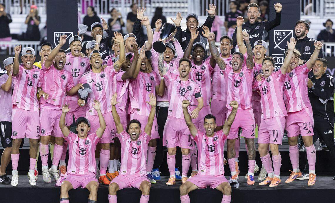 Inter Miami players celebrate with the MLS Eastern Conference final trophy after they defeated New York City FC during their match at Chase Stadium on Saturday, Nov. 29, 2025, in Fort Lauderdale, Fla.