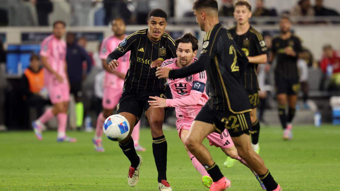 Apr 2, 2025; Los Angeles, California, USA; Inter Miami CF forward Lionel Messi (10) dribbles between LAFC midfielder Igor Jesus (6) and midfielder Cengiz Under (22) during the first half of a Concacaf Champions Cup Quarterfinal match at BMO Stadium. Mandatory Credit: Kiyoshi Mio-Imagn Images