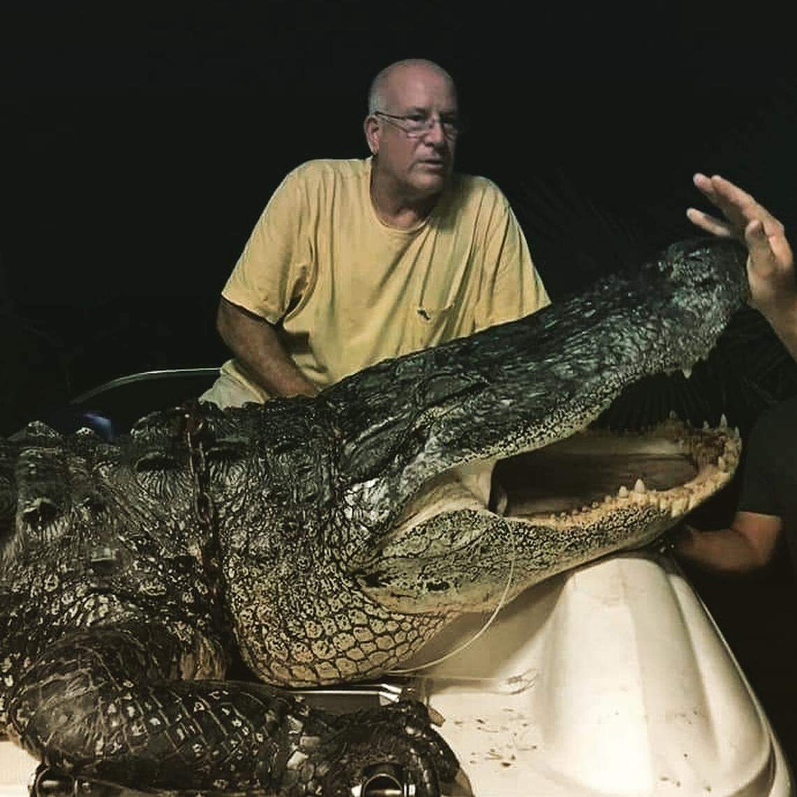 Cooper City resident Jim Howard snagged a 12-foot, more than 1,000-pound alligator from Lake Okeechobee on Aug. 16, 2018.