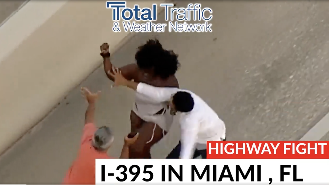 A crash on the MacArthur Causeway escalated when a woman with a screwdriver tried to attack a man, according to video posted on social media.