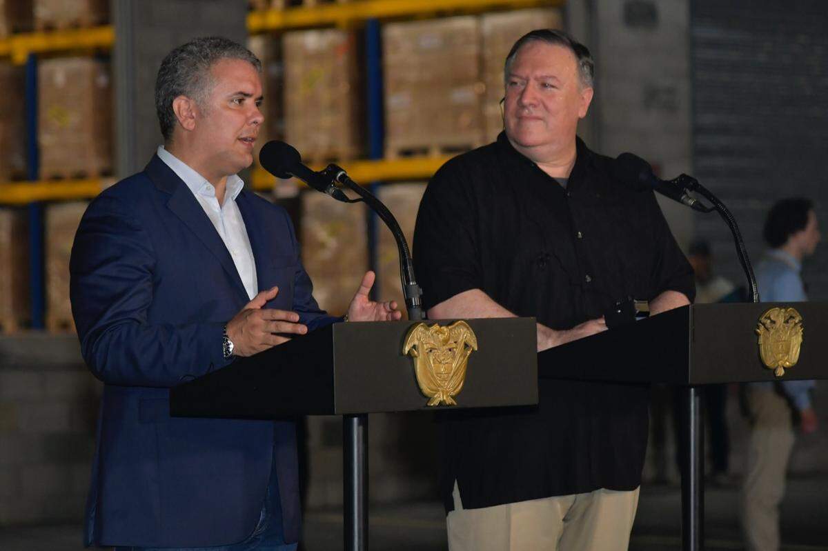 U.S. Secretary of State Mike Pompeo, right, and Colombian President Ivan Duque address the press near Cúcuta, Colombia. Pompeo finished up a four-nation tour that took him to Paraguay, Chile, Peru and Colombia on Sunday.