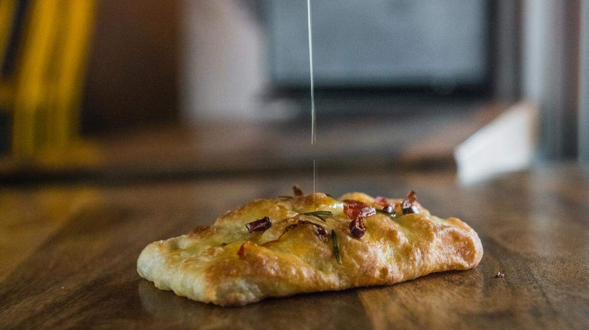 Housemade focaccia with Calabrian chiles and rosemary at the upcoming Ebra
