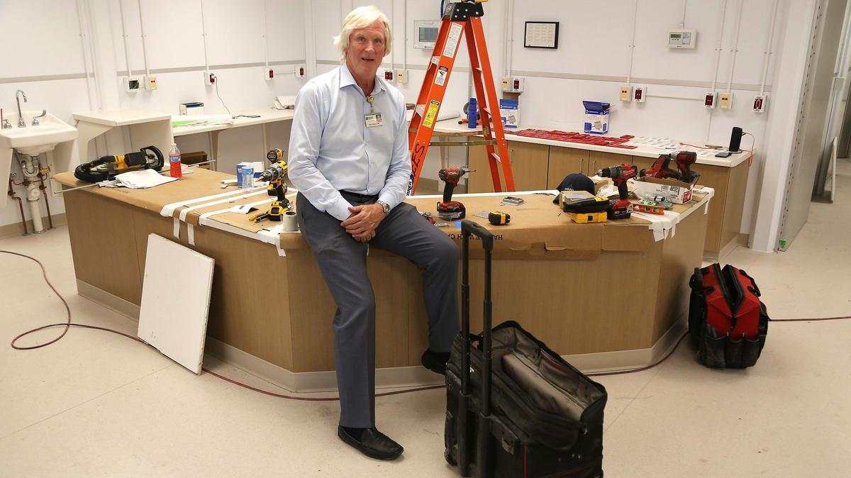 Rick Freeberg, CEO of Fishermen’s Community and Mariners Hospitals, sits inside the future nursing unit near the observation and inpatient rooms in July 2018 during the construction period of modular units that make up Fishermen’s Community Hospital after 2017’s Hurricane Irma. 