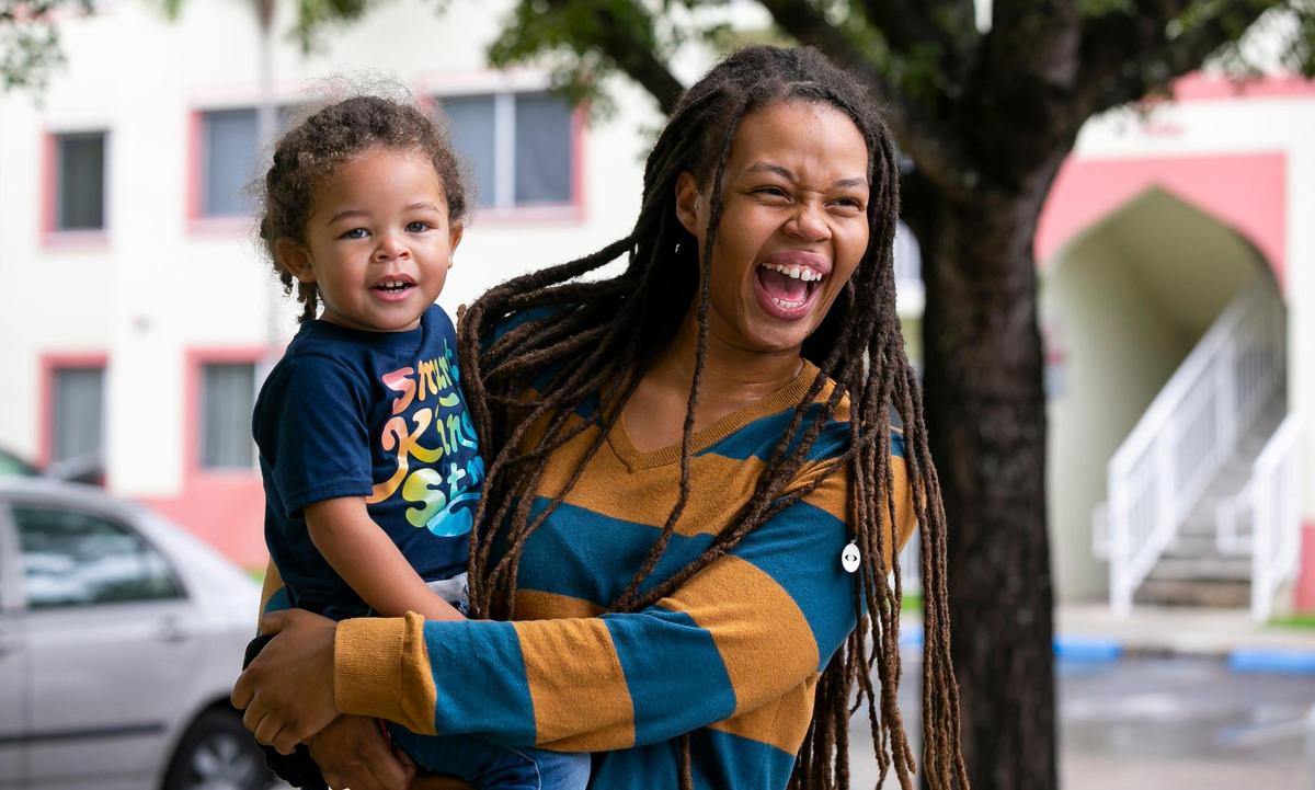 Joanyah Saintus, 26, and her son, Asterio Saintus, 3, attend a press conference hosted by The Children’s Trust at the Opa-locka Opa-locka Community Development Corporation Alice Brown Apartments on Tuesday, June 14, 2022, in Opa-locka. The Children’s Trust announced its board approved a $14 million investment in its Family and Neighborhood Support Partnerships, which will help South Florida families in need.