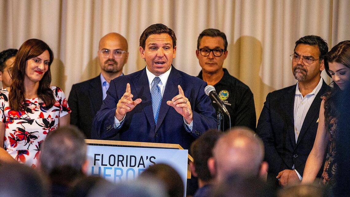 ‘We will not switch.’ Florida school officials defy DeSantis over pay cut threats