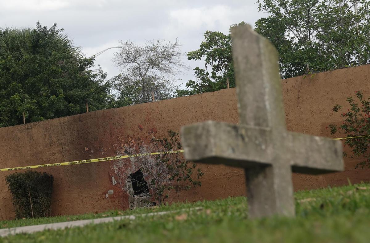 The wall in Woodlawn Cemetery in Fort Lauderdale where one person died and two were injured after an SUV lost control on Interstate 95 in Broward County and crashed there, Sunday, March 1, 2020, according to the Florida Highway Patrol.