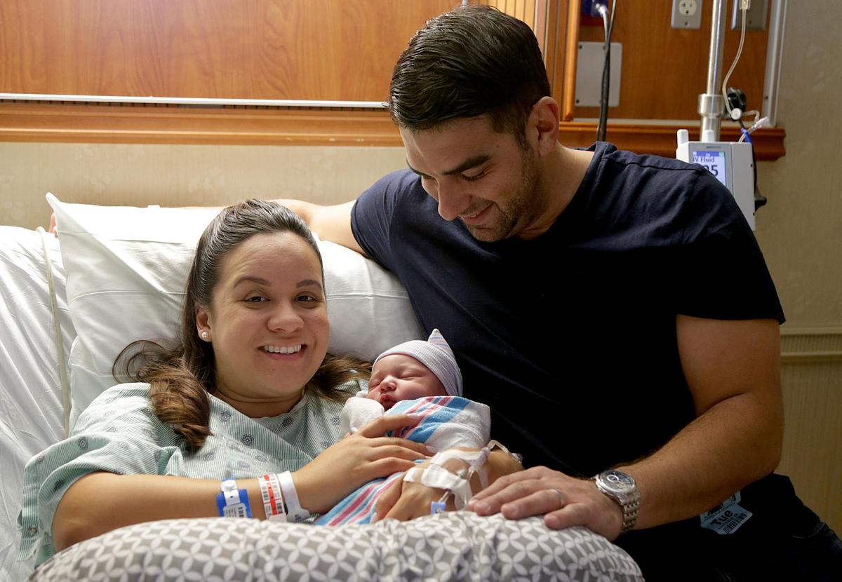 Jessica and Guillermo Miguel hold their son Jacob Miguel, the first baby born in 2019 at Baptist Hospital. He was born at 1:13 a.m. on Jan. 1, 2019, and weighed 8 pounds, 4 ounces and was 21 inches in length.