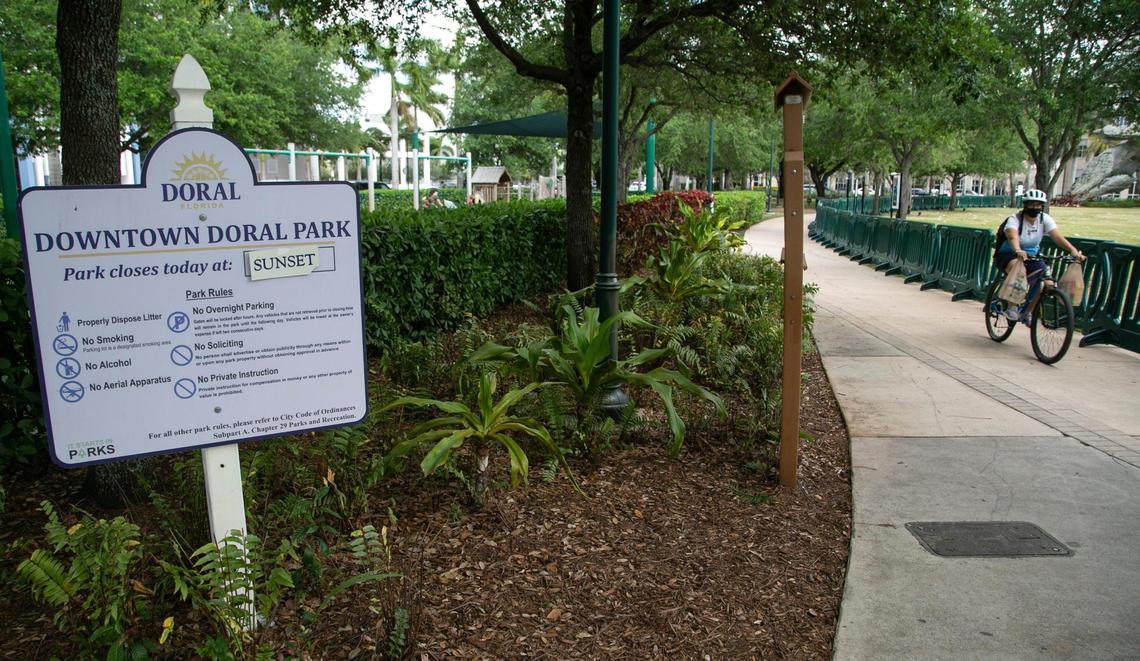 Doral, Florida, March 23, 2021 - A sign inside Downtown Doral Park explains the rules to users. There are 9 parks in the city with many amenities including a community center, lighted sports fields, basketball courts, tennis courts, bike-ways and shaded playgrounds. Doral has evolved in the last few years from a “logistics/warehouse” district to a place where residents can live, work and “play.” The city is trying to create a reputation as an art nexus; a central part of its downtown area has recently been rebranded as an arts district.