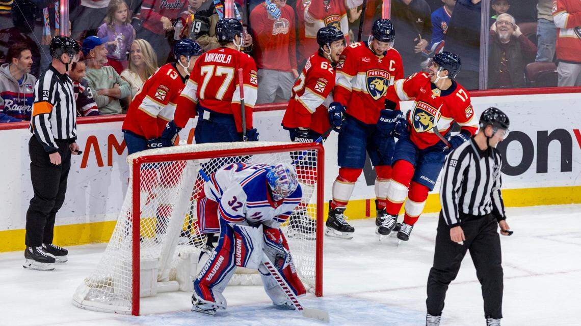 Florida Panthers forward Evan Rodrigues (17) reacts with teammates after scoring on New York Rangers goalie Jonathan Quick (32) during the first period of an NHL game at Amerant Bank Arena in Sunrise, Florida, on Friday, December 29, 2023.