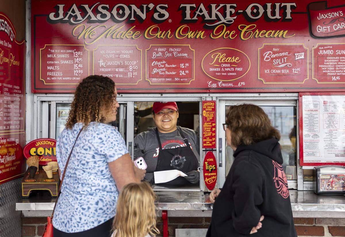 Customers order ice cream at Jaxson's Ice Cream Parlor & Restaurant on Thursday, Feb. 5, 2026, in Dania Beach, Fla. Jaxson's is celebrating its 70th anniversary this month.