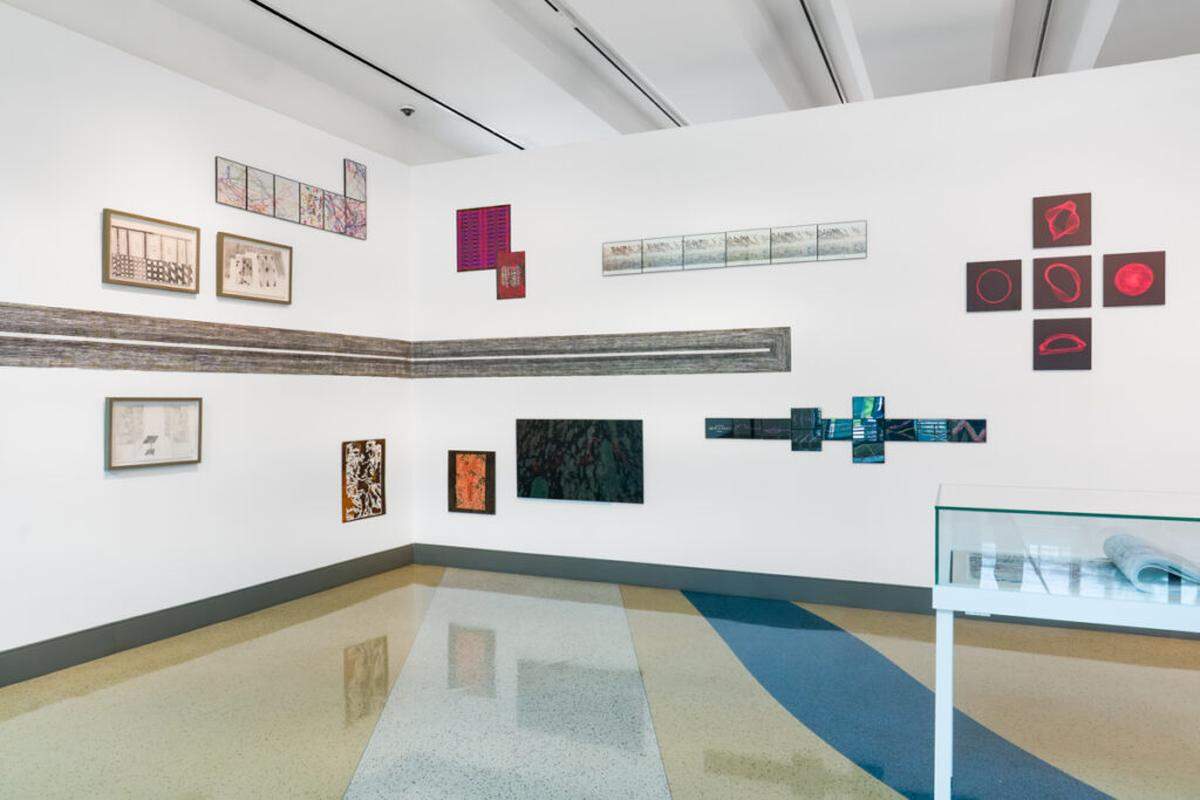 Installation view of “What’s My Line? Drawing as Experience,” presented by Edge Zones and curated by Dimitry Saïd Chamy and Charo Oquet at the Miami Beach Regional Library. The exhibition brings together 16 artists exploring drawing as process, memory, and spatial experience.
