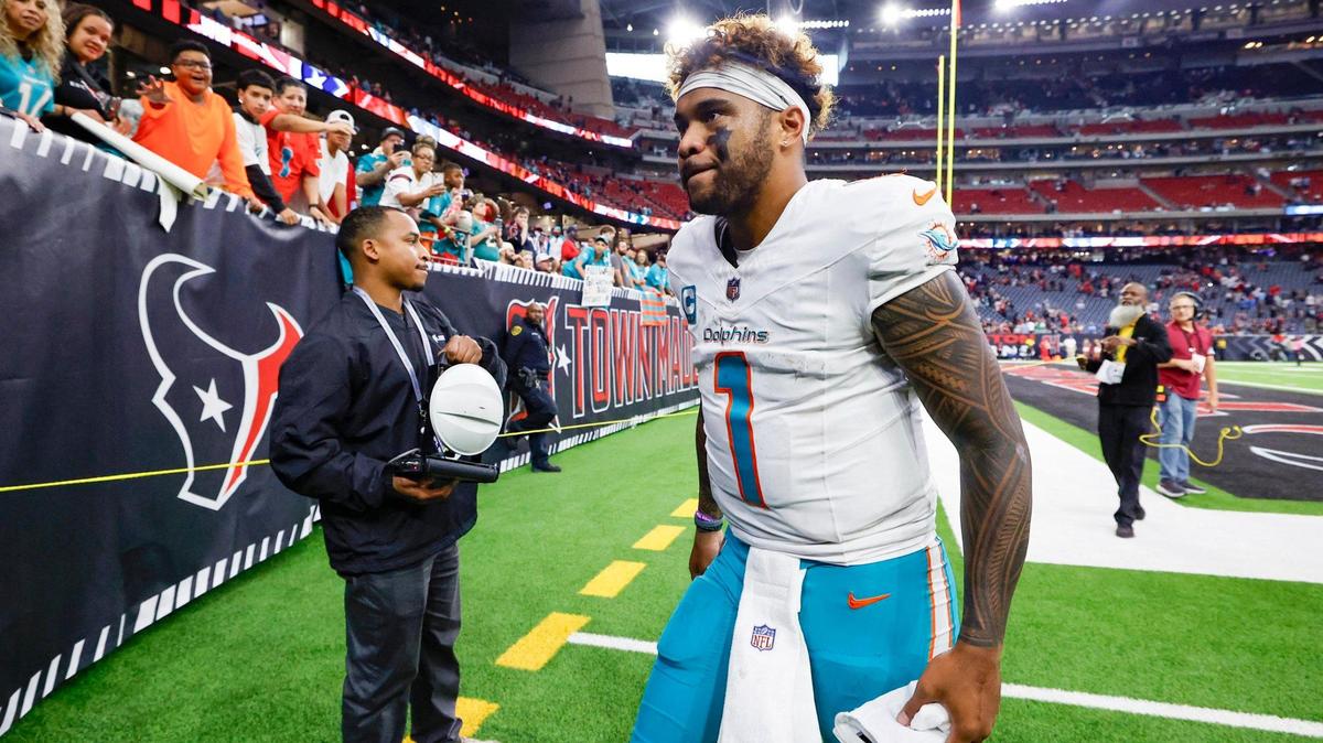 Miami Dolphins quarterback Tua Tagovailoa (1) walks off the field after the loss against the Houston Texans in their NFL football game at NRG Stadium in Houston, Texas, on Sunday, December 15, 2024.