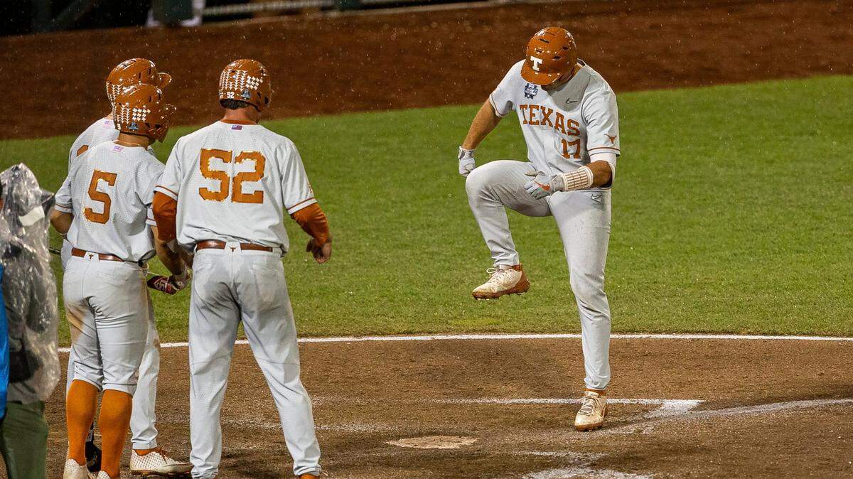 Texas’s Ivan Melendez (17) stomps on home plate after hitting a home run also scoring Zach Zubia (52) and Mike Antico (5) against Mississippi State in the ninth inning during a baseball game in the College World Series Friday June 25, 2021, at TD Ameritrade Park in Omaha, Neb.