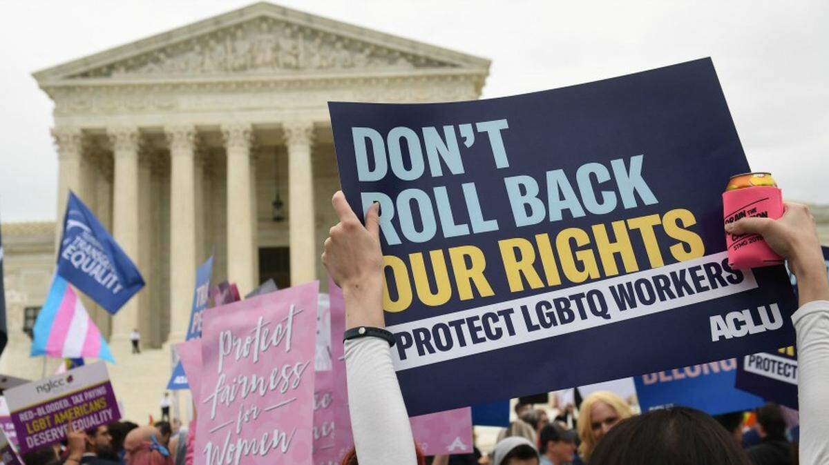 LGBTQ rights advocates rallied outside the U.S. Supreme Court as the court heard oral arguments in three cases dealing with workplace discrimination based on sexual orientation.