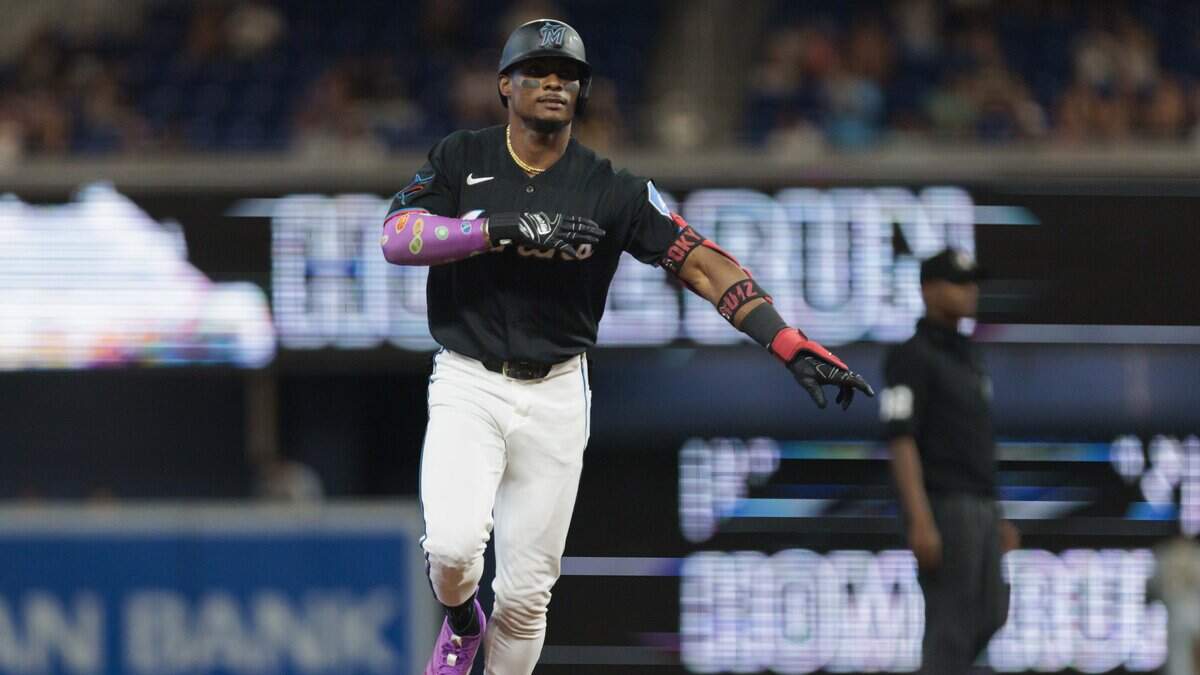 Miami Marlins right fielder Esteury Ruiz (3) reacts to hitting a home run during the third inning of a game against the