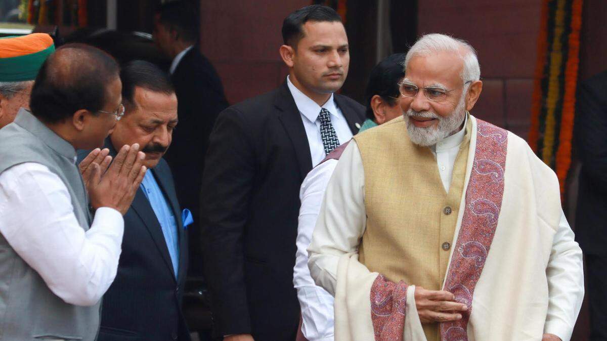 India’s Prime Minister Narendra Modi, right, being greeted by cabinet members on the opening day of the budget session at Parliament House in New Delhi.