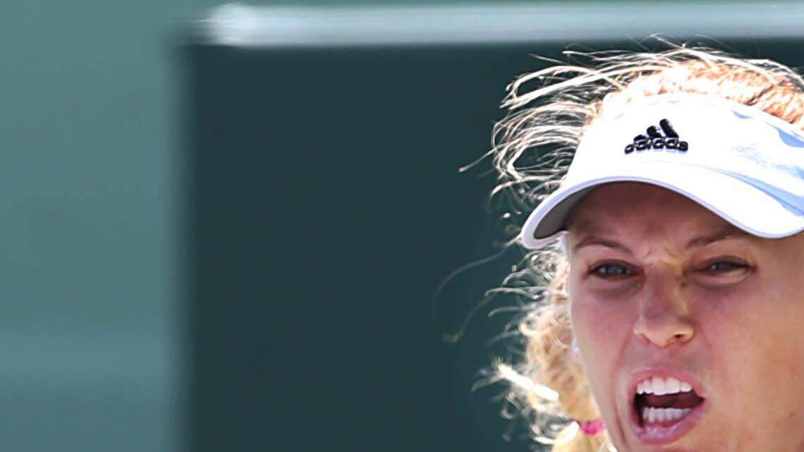 Caroline Wozniack, (DEN), returns against Kaia Kanepi (EST), during the women's singles third round at the Miami Open Tennis 2015, in Key Biscayne Saturday, March 28, 2015.
