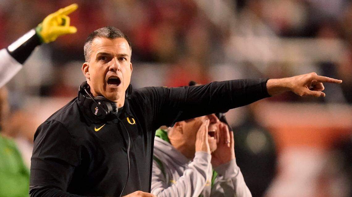 Oregon head coach Mario Cristobal shouts in the second half during an NCAA college football game against Utah, Saturday, Nov. 20, 2021, in Salt Lake City. (AP Photo/Rick Bowmer)